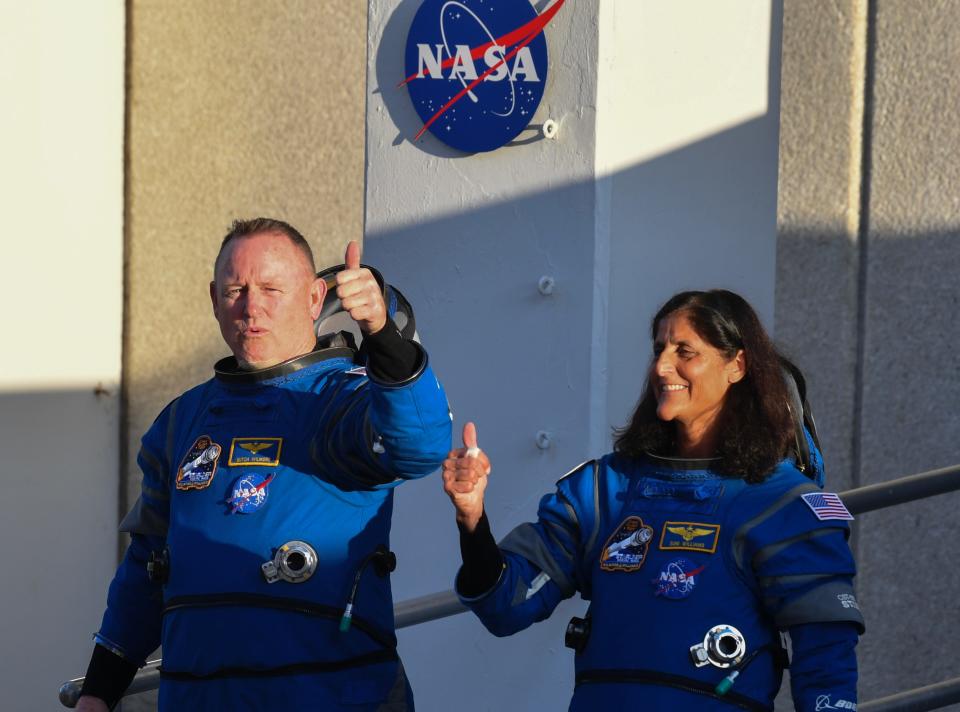 NASA astronauts Suni Williams and Butch Wilmore say goodbye to friends and family as they leave astronaut crew quarters on their way to the launch pad Monday -- but crews scrubbed their mission soon afterward.