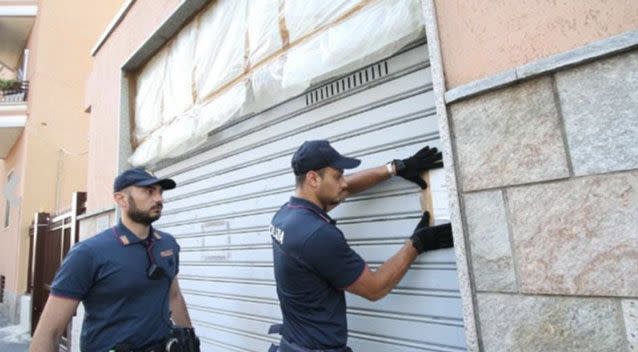 Police cordoned off the property as they conducted an investigation. Photo: AP