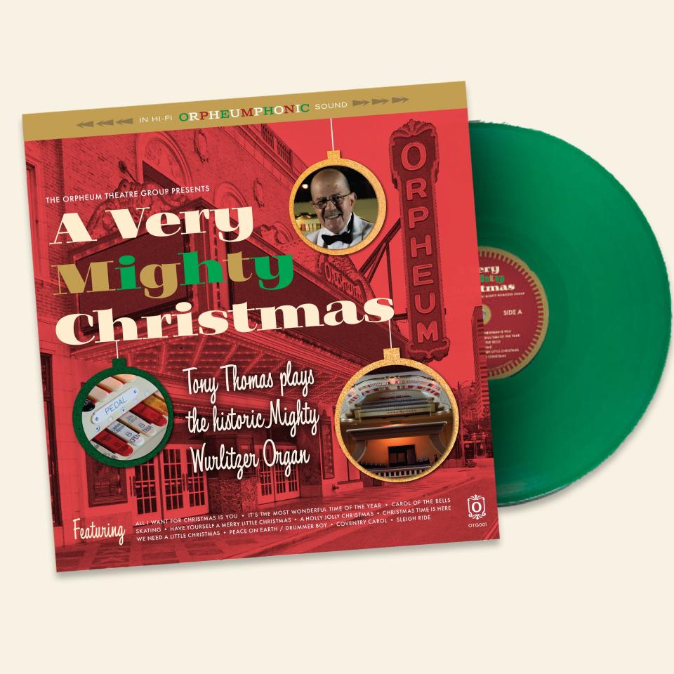 Green vinyl and a cover design by Kerri Mahoney amplify the cheery holiday aura of "A Very Mighty Christmas."