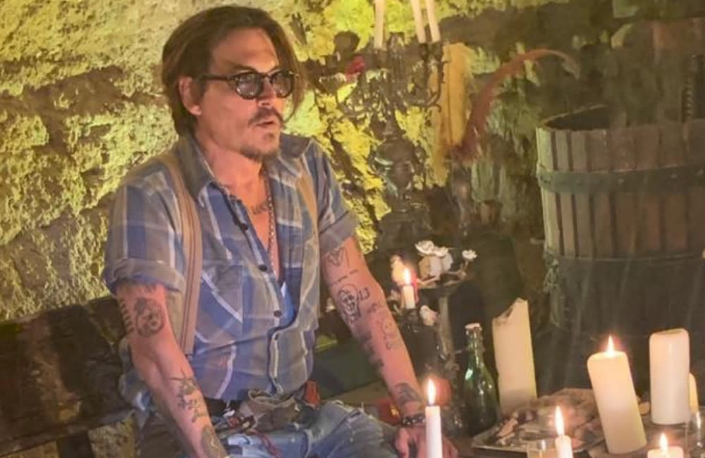 Johnny Depp is set to direct his first film in 25 years, about an artist who died broke credit:Bang Showbiz