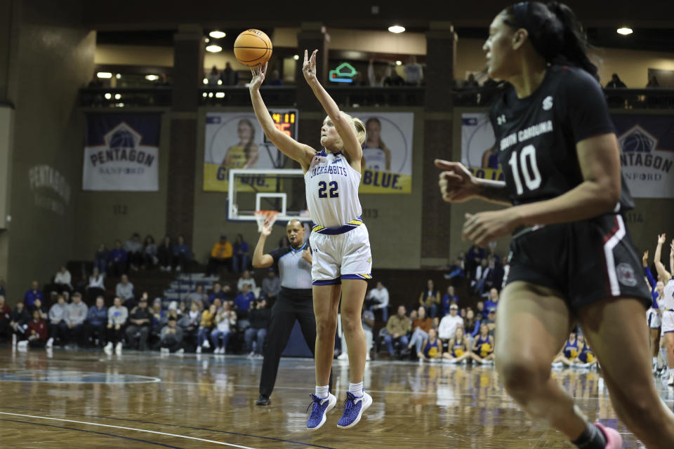 South Dakota State's G Madysen Vlastuin shoots a 3-point shot during the first half of an NCAA college basketball game against South Carolina in Sioux Fall, S.D. on Thursday, Dec. 15, 2022. (AP Photo/Josh Jurgens)