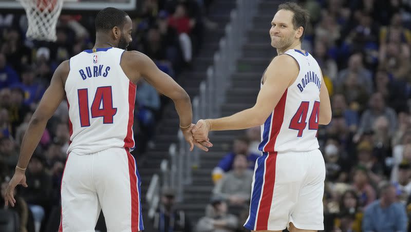 Detroit Pistons guard Alec Burks (14) and forward Bojan Bogdanovic during a game against the Golden State Warriors in San Francisco, Friday, Jan. 5, 2024. The two former Utah Jazz players were traded to the Knicks on Thursday.