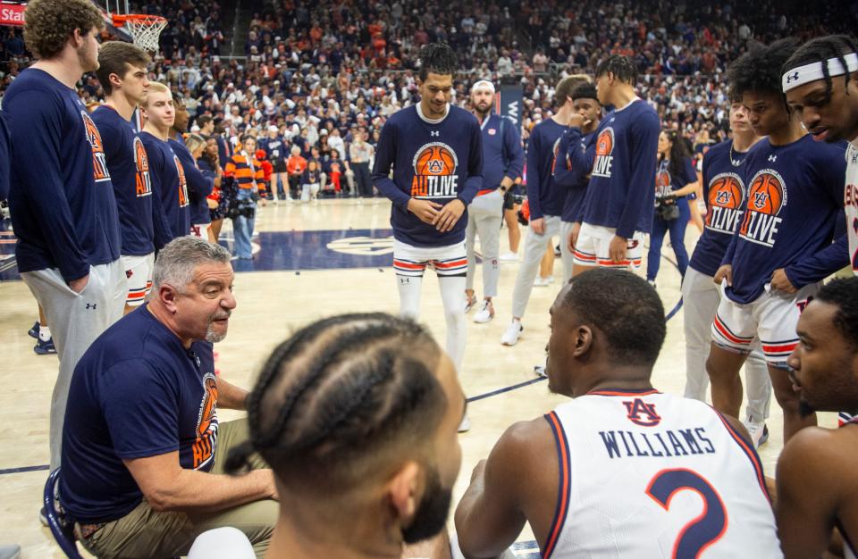 Auburn Tigers head coach Bruce Pearl talks with his team before the game as Auburn Tigers take on Kentucky Wildcats at Neville Arena in Auburn, Ala., on Saturday, Feb. 17, 2024. Kentucky Wildcats lead Auburn Tigers 39-29 at halftime.