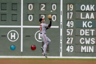 Baltimore Orioles' Kyle Stowers reaches for a double hit by Boston Red Sox's Christian Arroyo in the second inning of a baseball game, Thursday, Sept. 29, 2022, in Boston. (AP Photo/Steven Senne)