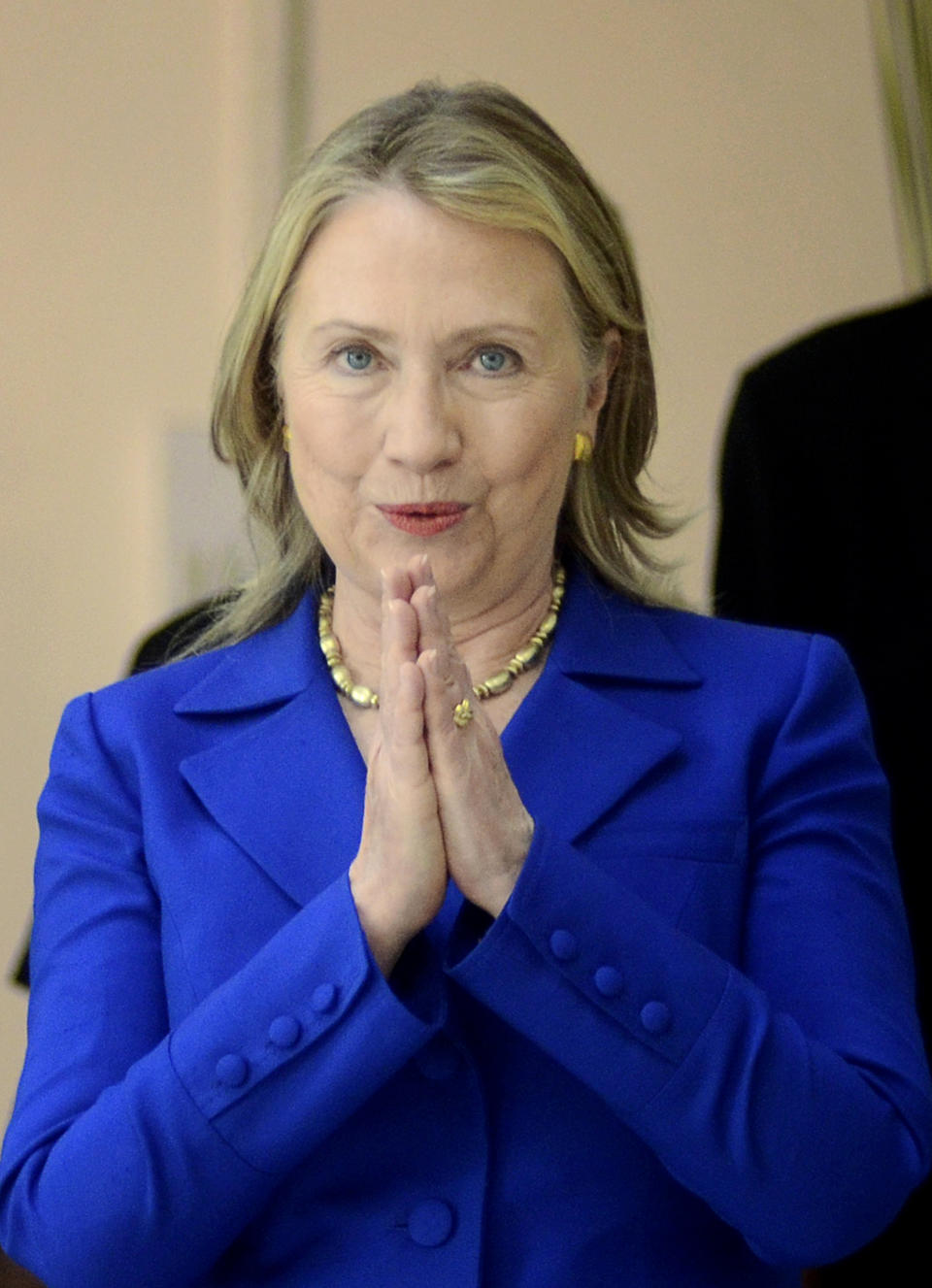 U.S. Secretary of State Hillary Rodham Clinton gestures with a traditional Indian "namaste" before a meeting in Kolkata, India, Monday, May 7, 2012. Clinton met with West Bengal Chief Minister Mamata Banerjee, a key partner of India's ruling coalition who has stymied government efforts to lift restrictions on foreign-owned investments in the country. (AP Photo)