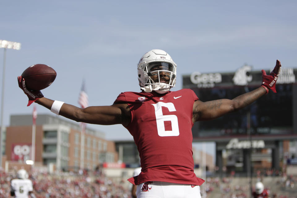 Washington State wide receiver Donovan Ollie celebrates his touchdown during the first half of an NCAA college football game against Colorado State, Saturday, Sept. 17, 2022, in Pullman, Wash. (AP Photo/Young Kwak)