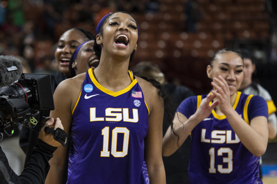 LSU's Angel Reese (10) celebrates the team's win over Utah in a Sweet 16 college basketball game of the women's NCAA Tournament in Greenville, S.C., Friday, March 24, 2023. (AP Photo/Mic Smith)