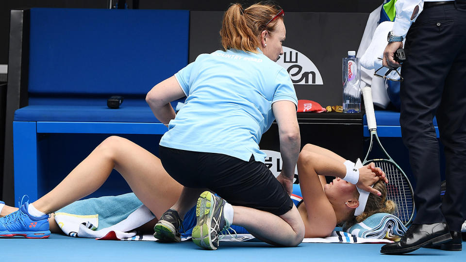 Dayana Yastremska, pictured here receives medical treatment during her clash Caroline Wozniacki at the Australian Open.