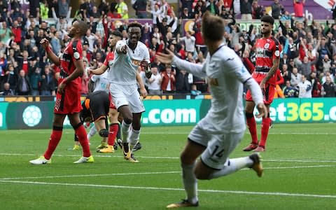 Tammy Abraham celebrates scoring Swansea's first - Credit: GETTY IMAGES