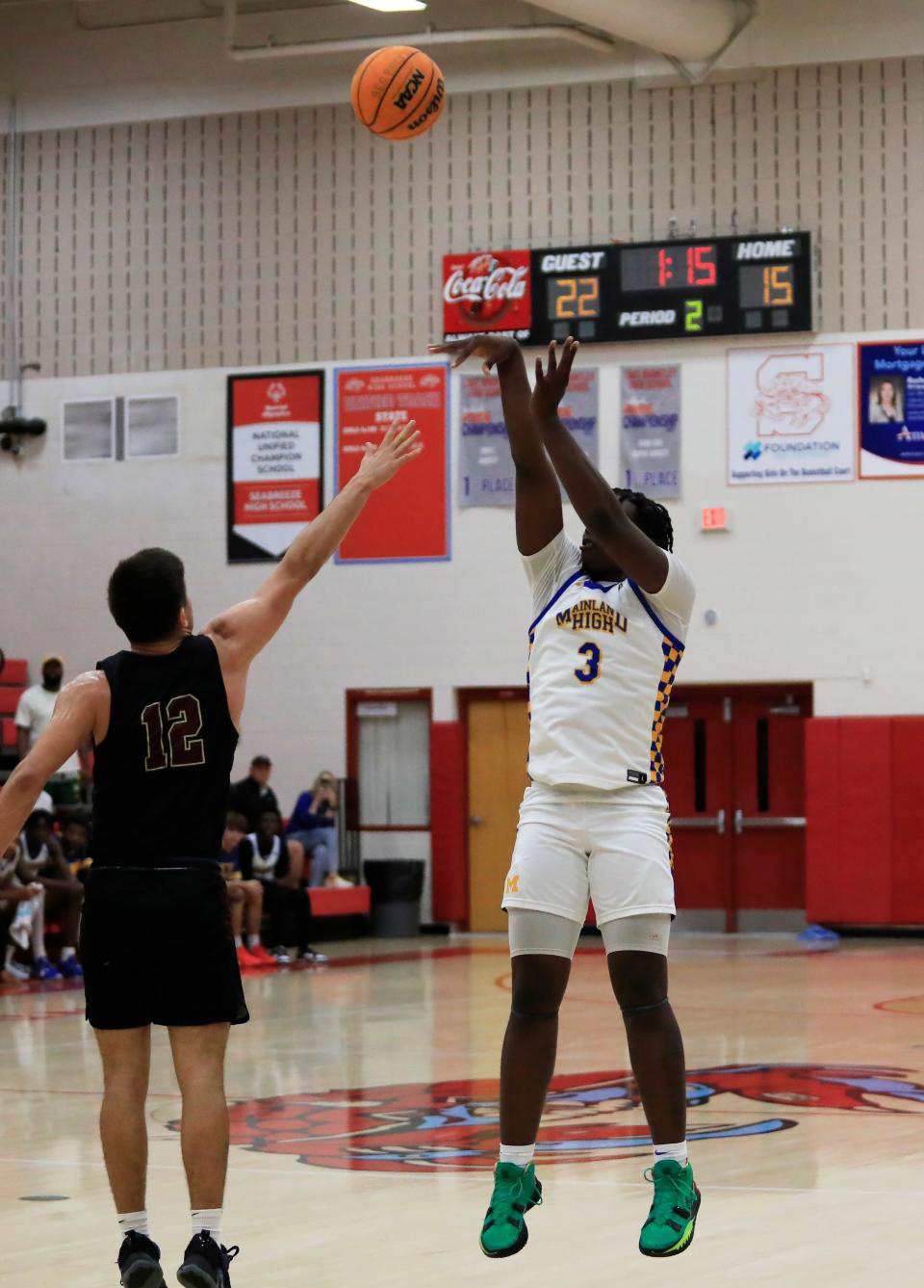 Mainland's Narayan Thomas (3) shoots a jump shot against St. Augustine during the District 4-5A finals basketball game at Seabreeze High School on Saturday, Feb. 10, 2024.