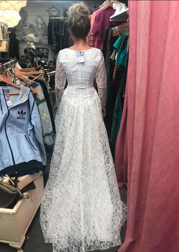 The dress was a thrift shop find she picked up just one day after getting engaged. Photo: Facebook/cat.wilkinson.56