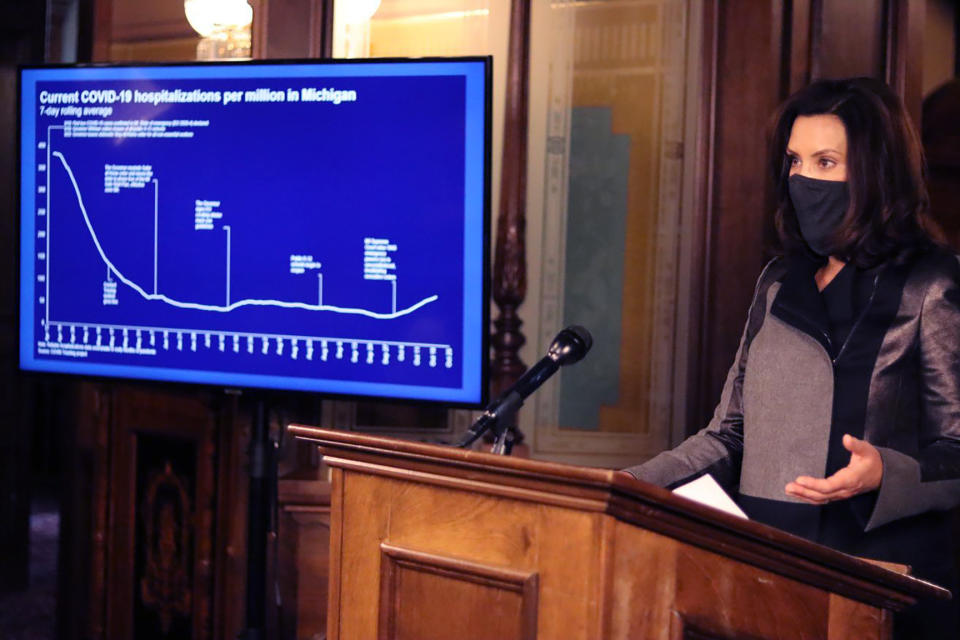 In this photo provided by the Michigan Office of the Governor, Michigan Gov. Gretchen Whitmer addresses the state during a speech in Lansing, Mich., Wednesday, Oct. 21, 2020. The governor is warning that Michigan has more confirmed cases of the coronavirus than ever, noting a sharp increase since the state Supreme Court invalidated her sweeping orders earlier this month. Since the court decision on Oct. 2, the seven-day case average is up to 1,818 — nearly double. (Michigan Office of the Governor via AP)