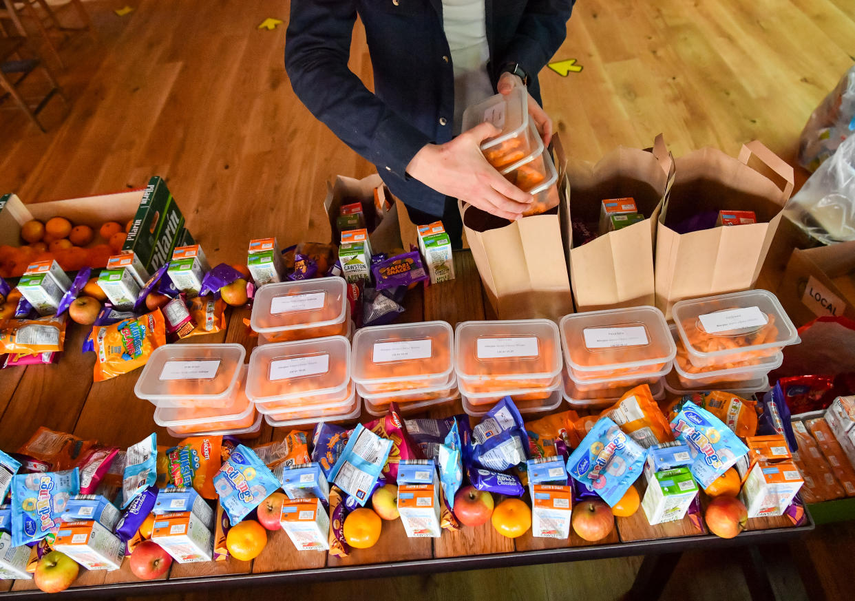 Andy Hope-Johnstone prepares free packed lunch bags for delivery at the Gallimaufry pub in Bristol, who are providing free school meals for children over the half term holidays. Local councils and businesses are continuing to pledge free food for children in need during this week's half term break after the Government defeated a Labour motion to extend free school meals provision in England over the holidays. (Photo by Ben Birchall/PA Images via Getty Images)