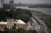 Traffic moves on a street in Sudan's capital Khartoum, Tuesday, Sept. 21, 2021. Sudanese authorities reported a coup attempt on Tuesday by a group of soldiers but said the attempt failed and that the military remains in control. The development underscored the fragility of Sudan’s path to democracy, more than two years after the military's overthrow of longtime autocrat Omar al-Bashir amid a public uprising against his three-decade rule. (AP Photo/Marwan Ali)