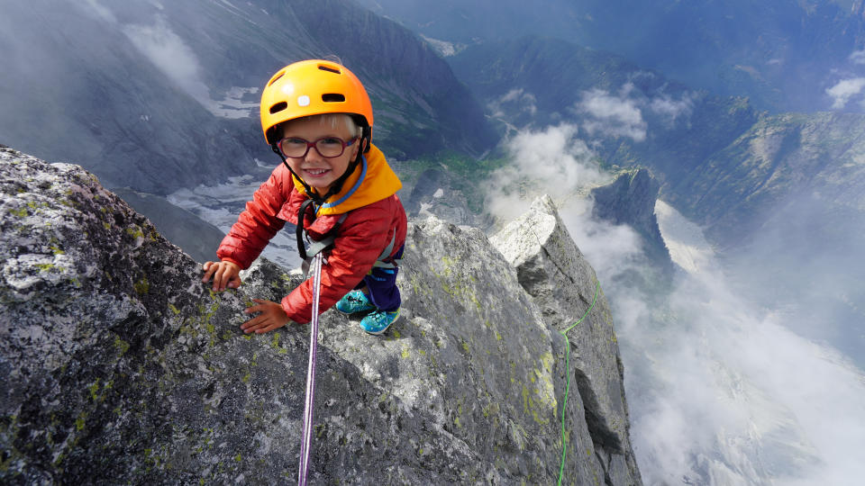 The three-year-old is following in the footsteps of his professional climber father. (SWNS)