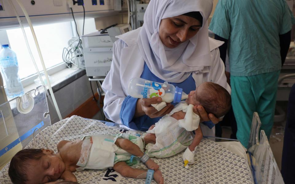 Palestinian medics care for premature babies evacuated from Al Shifa hospital to the Emirates hospital in Rafah in the southern Gaza Strip