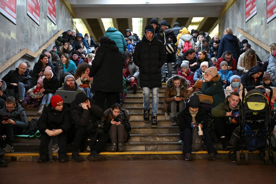 People take shelter inside a metro station during massive Russian missile attacks in Kyiv, Ukraine 26 January 2023 (Reuters)