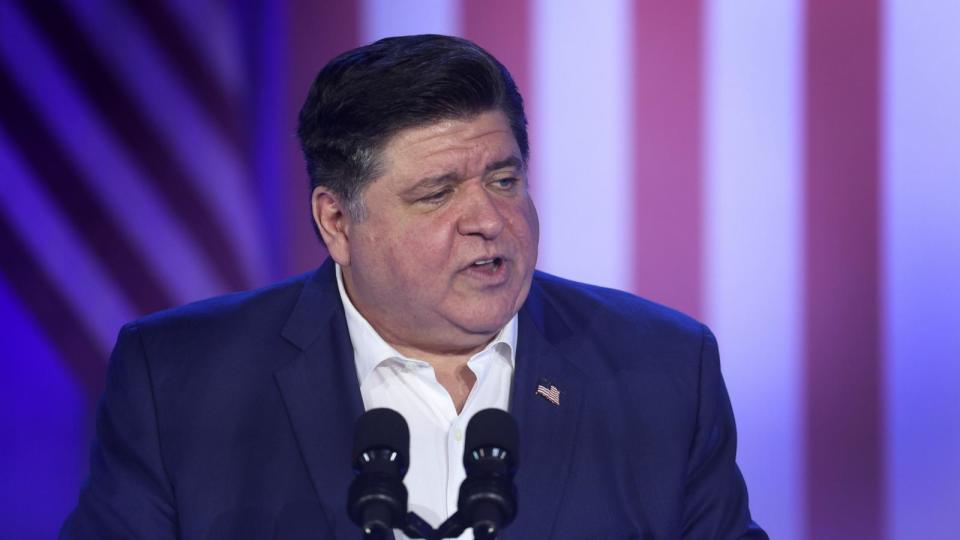 PHOTO: Illinois Gov. J.B. Pritzker speaks to auto workers before the arrival of President Joe Biden at the Community Complex Building, Nov. 9, 2023, in Belvidere, Ill. (Scott Olson/Getty Images)