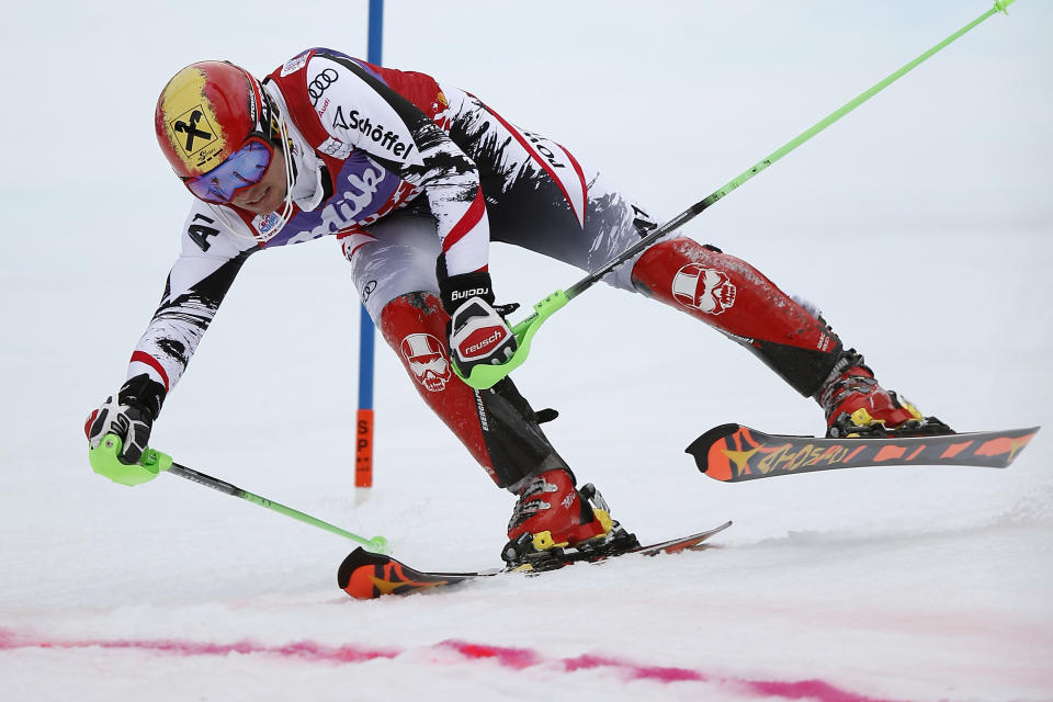 Marcel Hirscher of Austria crosses the finish line during the first run of the Alpine skiing slalom World Cup race at the Lauberhorn in Wengen, Switzerland, Sunday, Jan. 19, 2014. (AP Photo/Keystone, Peter Klaunzer)