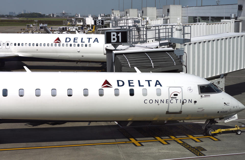 NASHVILLE, TENNESSEE - SEPTEMBER 4, 2019: A Delta Connection passenger jet (Bombardier CRJ900) parked at a gate beside a Delta Airlines plane at Nashville International Airport in Nashville, Tennessee. (Photo by Robert Alexander/Getty Images)