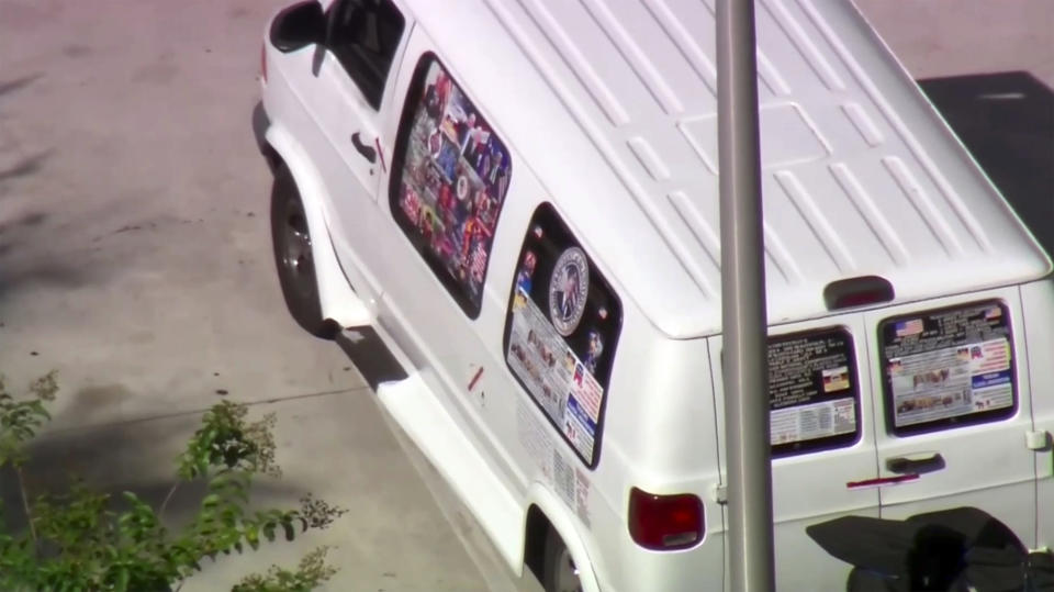 This frame grab from video provided by WPLG-TV shows the van parked in Plantation, Fla., on Friday, Oct. 26, 2018.