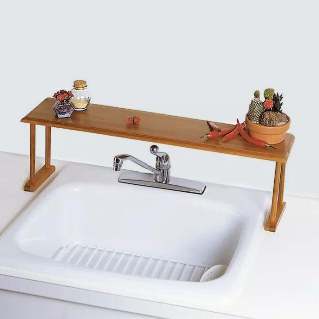 Shelf Over Sink In Kitchen by Stocksy Contributor Sergey