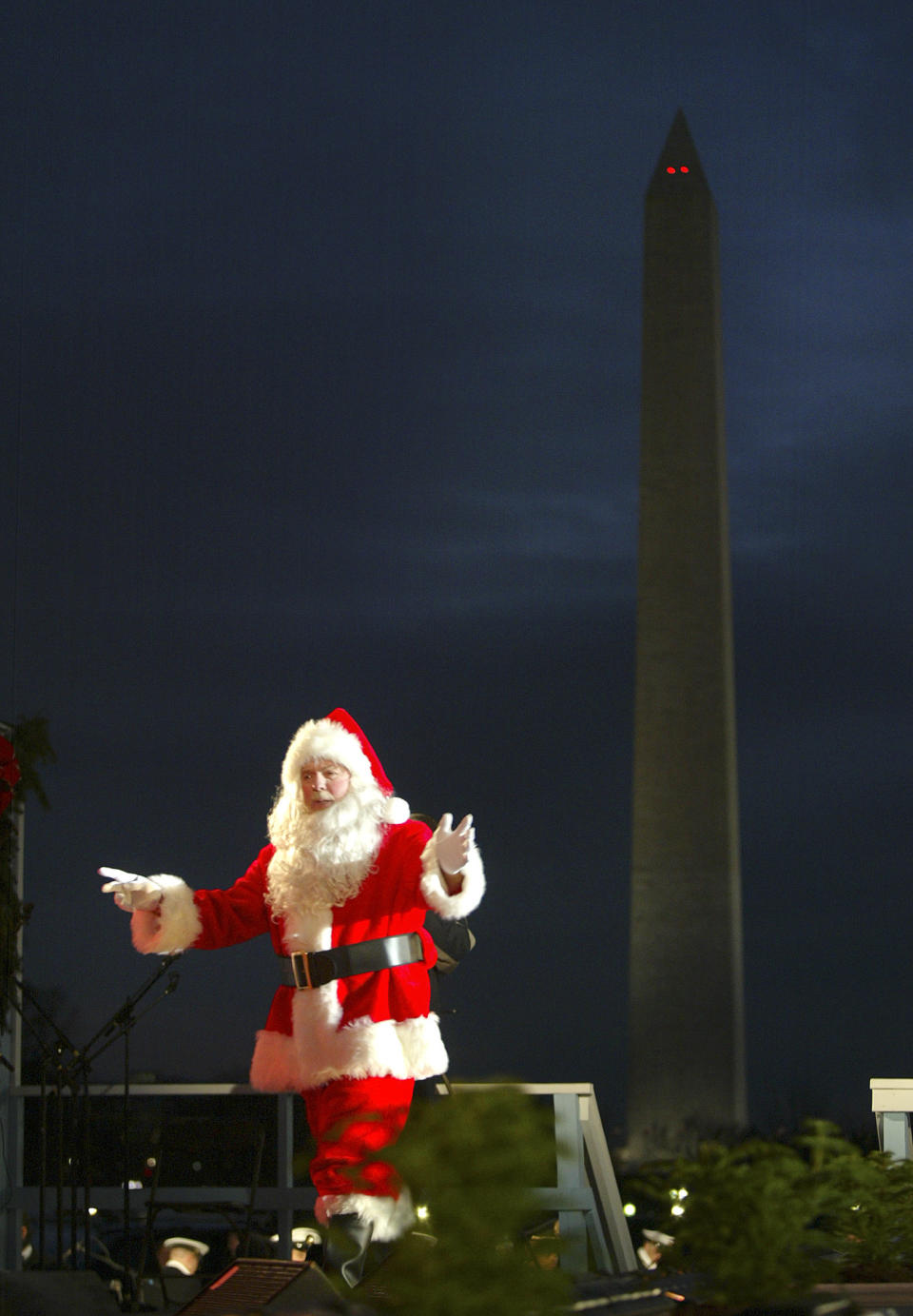 Merlin Olsen, dressed as Santa Claus, arrives on stage to participate in the Pageant of Peace on the Ellipse near the White House, Thursday, Dec. 1, 2005, in Washington. President Bush and his wife, Laura, participated in the event by making a few remarks and lighting the National Christmas Tree.(AP Photo/Lawrence Jackson)
