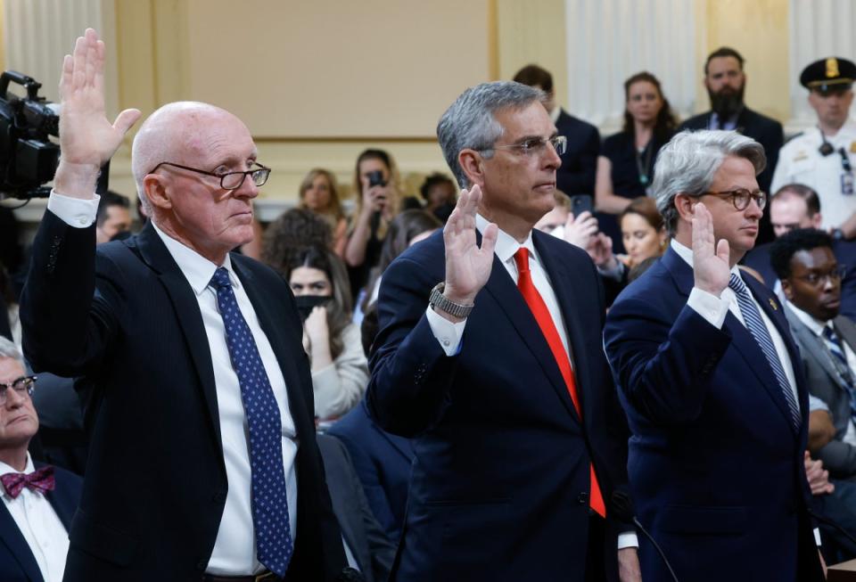 Rusty Bowers, Arizona House Speaker; Brad Raffensperger, Georgia Secretary of State; and Gabriel Sterling, Georgia Secretary of State Chief Operating Officer, are sworn in (Getty Images)