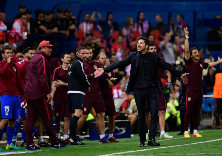 Atletico Madrid coach Diego Simeone (2ndR) hailed his side's display against Bayern Munich as one of the best in his hugely successful five-year reign