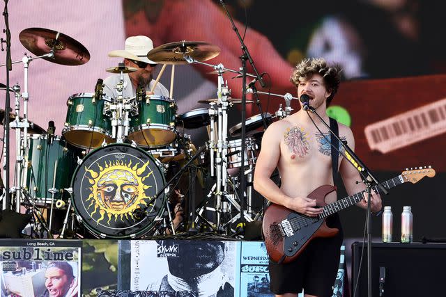 <p>Arturo Holmes/Getty</p> Jakob Nowell of Sublime performs at the Coachella Main Stage 2024.