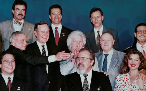 Barbara Bush gestures during a photo shoot with celebrities at a party in Los Angeles - Credit: RICK WILKING/REUTERS