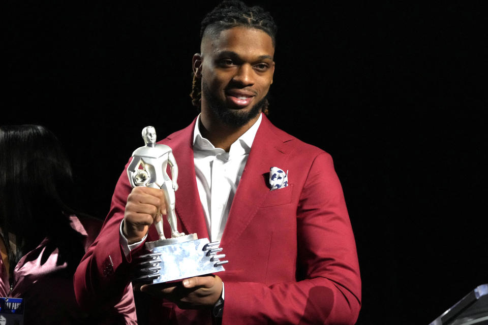 Feb 8, 2023; Phoenix, AZ, USA; Buffalo Bills safety Damar Hamlin accepts the Alan Page Community Award during the NFLPA press conference at the Phoenix Convention Center. Mandatory Credit: Kirby Lee-USA TODAY Sports