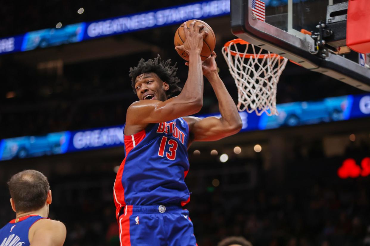 Pistons center James Wiseman grabs a rebound against the Hawks in the second quarter of the Pistons' 130-124 loss on Monday, Dec. 18, 2023, in Atlanta.