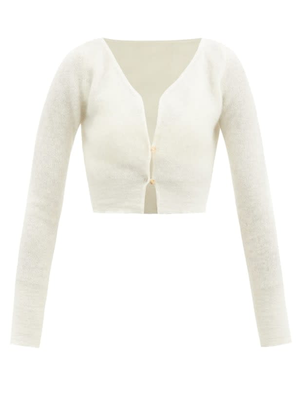 <p>Jacquemus Alzou Cropped Mohair-Blend Cardigan, $316, <a href="https://rstyle.me/+vKLLZzLCbrOZdR1-FRXLNg" rel="nofollow noopener" target="_blank" data-ylk="slk:available here;elm:context_link;itc:0;sec:content-canvas" class="link ">available here</a>.</p>