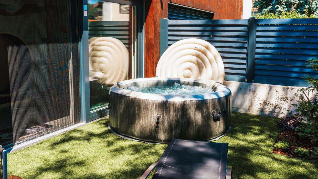 inflatable hot tub in backyard