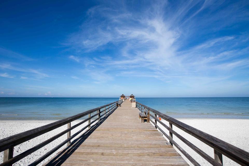 D E N N I S  A X E R  Photography / Getty Images Naples Pier