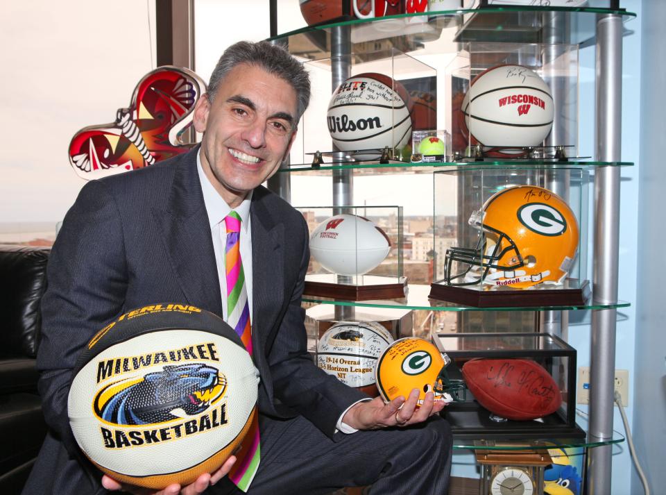 David Gruber, shown in his law office in 2014, is a big backer of Wisconsin sports. He has courtside seats at Fiserv Forum.