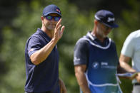 Adam Scott, of Australia, waves to the gallery after putting on the fourth green during the second round of the BMW Championship golf tournament at Wilmington Country Club, Friday, Aug. 19, 2022, in Wilmington, Del. (AP Photo/Nick Wass)