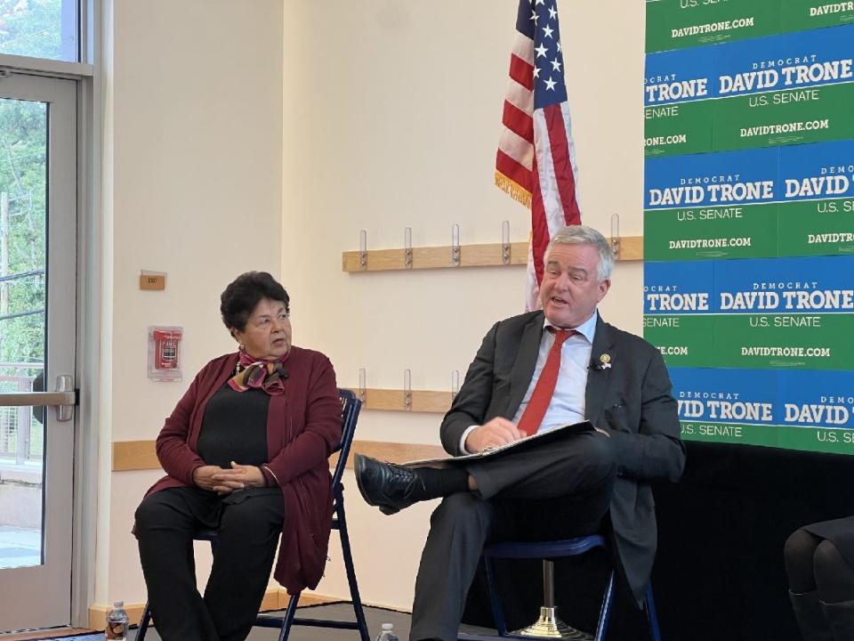 Former state Del. Ana Sol Gutiérrez, D-Montgomery, left, listens to U.S. Rep. David Trone, D-6th, right during a Hispanic Heritage Month event Trone's campaign hosted in Prince George's County's Hyattsville, Maryland on Oct. 15, 2023. Food was available at the event from Casa Dora restaurant.