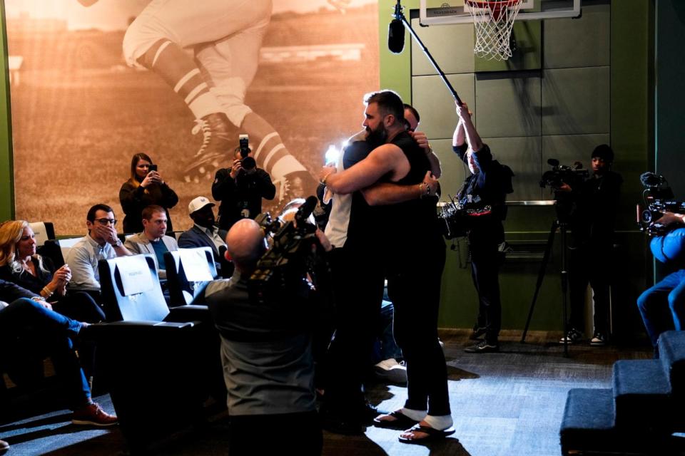 PHOTO: Philadelphia Eagles' Jason Kelce embraces his brother, Kansas City Chiefs' Travis Kelce, after an NFL football press conference announcing his retirement in Philadelphia, March 4, 2024.  (Matt Rourke/AP)