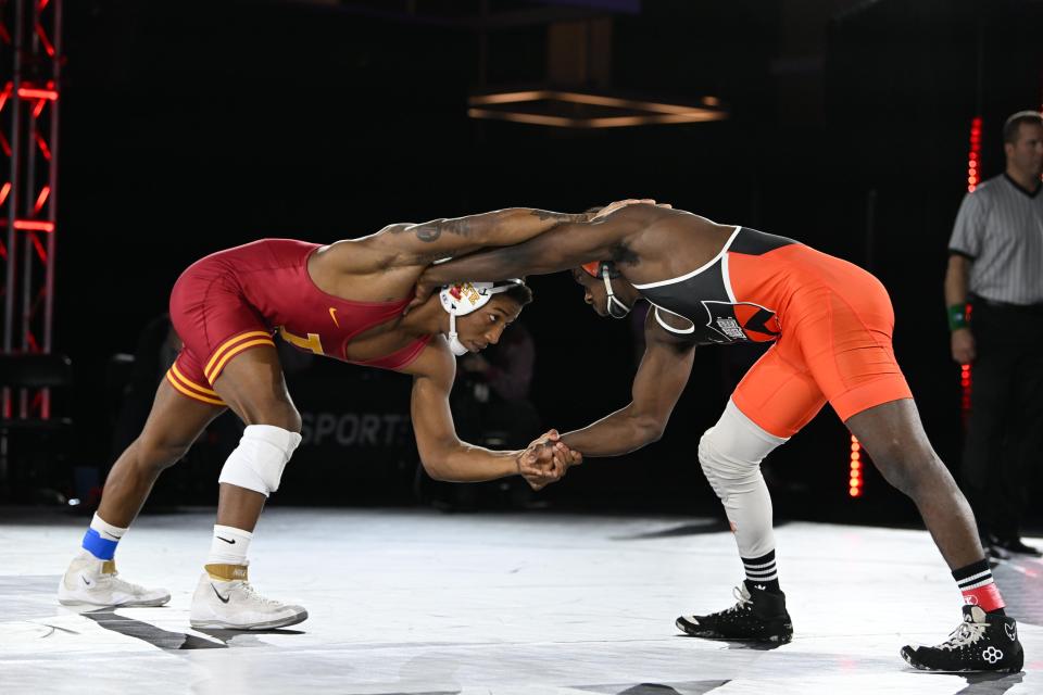 Iowa State's David Carr, left, wrestles Princeton's Quincy Monday at the 2022 NWCA All-Star Classic in Austin, Texas. Carr beat Monday, 2-1.