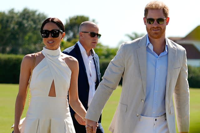 <p>Rebecca Blackwell/AP</p> Meghan Markle and Prince Harry arrive for the 2024 Royal Salute Polo Challenge to Benefit Sentebale, Friday, April 12, 2024, in Wellington, Fla.