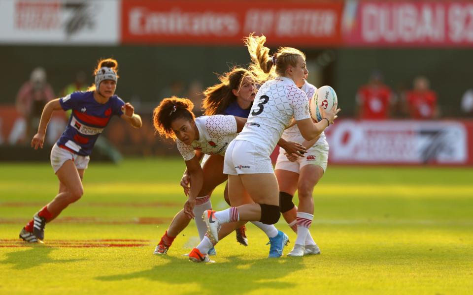 Abi Burton of England runs with the ball during the match between England and France at the Dubai Sevens in 2019 - GETTY IMAGES