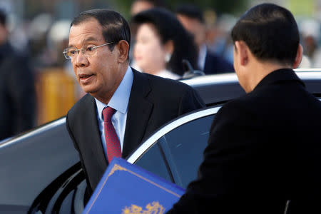 Cambodian Prime Minister Hun Sen arrives to attend the ceremony to mark the 39th anniversary of the toppling of Pol Pot's Khmer Rouge regime, in Phnom Penh, Cambodia, January 7, 2018. REUTERS/Samrang Pring