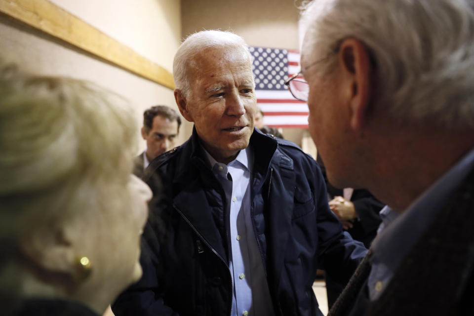 Democratic presidential candidate former Vice President Joe Biden talks with audience members during a town hall meeting, Thursday, Oct. 31, 2019, in Fort Dodge, Iowa. (AP Photo/Charlie Neibergall)