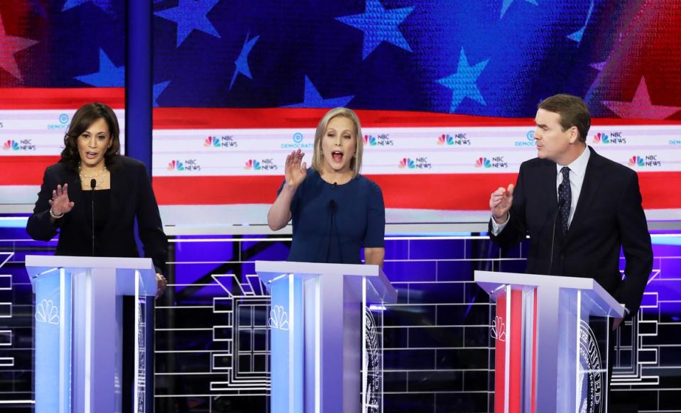 Then-Sen Kamala Harris (D-Calif) (left) and Sen Michael Bennet (D-Colo) both sought the Democratic presidential nomination along with Sen Kirsten Gillibrand (D-NY) (centre) but came up short. They also collaborated on child poverty policy in the past (Getty Images)