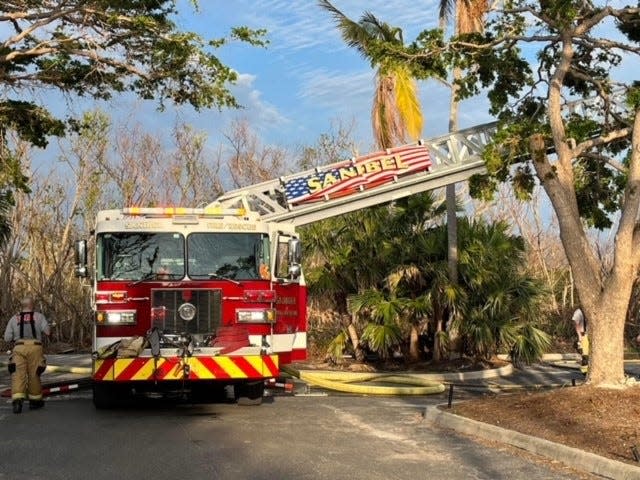 A Sanibel Fire Rescue District ladder truck was deployed to help extinguish a fire at The Dunes Golf and Tennis Club on Sanibel Island on Friday, Nov. 18, 2022.  The golf carts at the club erupted into flames.