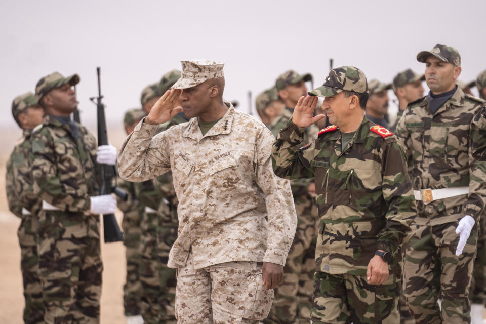 Gen. Michael Langley, USMC, Commander, U.S. Africa Command, center, and Major General Mohammed Berrid, Inspector General of Moroccan Royal Armed Forces, attend the 20th edition of the African Lion military exercise, in Tantan, south of Agadir, Morocco, Friday, May 31, 2024. (AP Photo/Mosa'ab Elshamy)