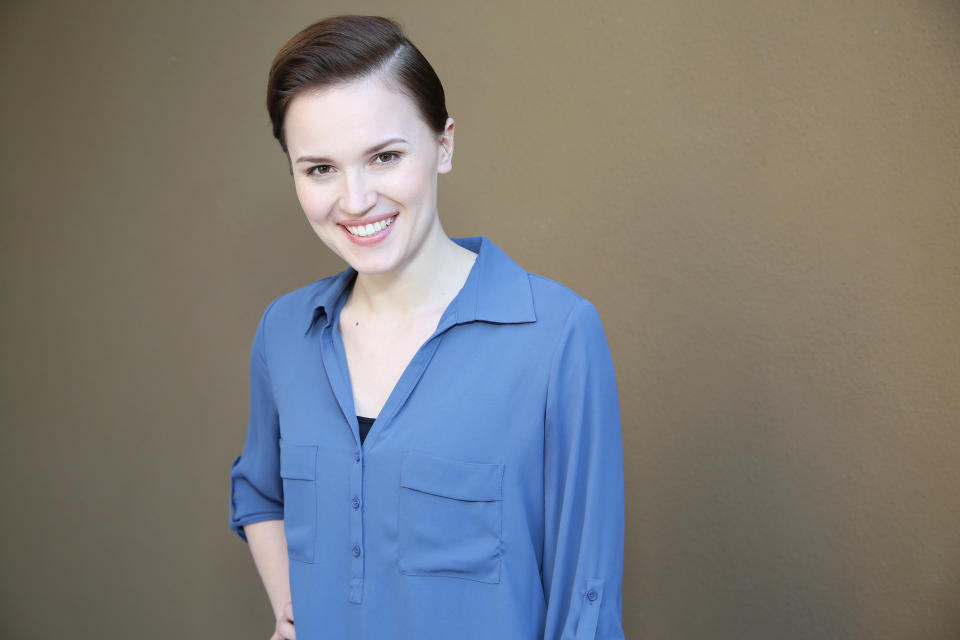 In this Saturday, March 8, 2014 photo, Veronica Roth, author of the book "Divergent," poses for a portrait in Beverly Hills, Calif. The movie, "Divergent," directed by Neil Burger, stars Shailene Woodley, Theo James and Kate Winslet and releases on Friday, March 21, 2014. (Photo by Annie I. Bang /Invision/AP)