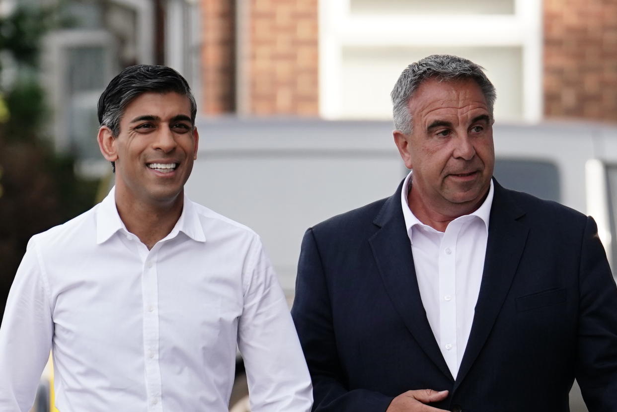 Prime Minister Rishi Sunak (left) and newly elected Conservative MP Steve Tuckwell arriving at the Rumbling Tum cafe in Uxbridge, west London, following the party's success in the Uxbridge and South Ruislip by-election. Picture date: Friday July 21, 2023. (Photo by Jordan Pettitt/PA Images via Getty Images)